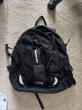 The North Face Black Backpack with Mesh Pockets
